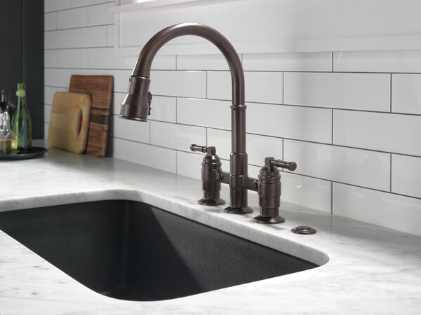 Delta 2390L-RB-DST Broderick 2-Handle Widespread Bridge Kitchen Faucet with Pulldown Sprayer in Venetian Bronze Finish | Plumbers Center